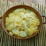 Pommes Anna classic French dish of sliced, layered potatoes cooked in a very large amount of melted butter.