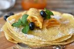 Traditional pancakes with a blueberry topping