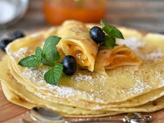 Traditional pancakes with a blueberry topping