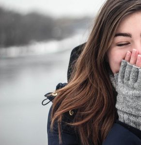 cold-sneeze-young woman covering nose-takes zinc?