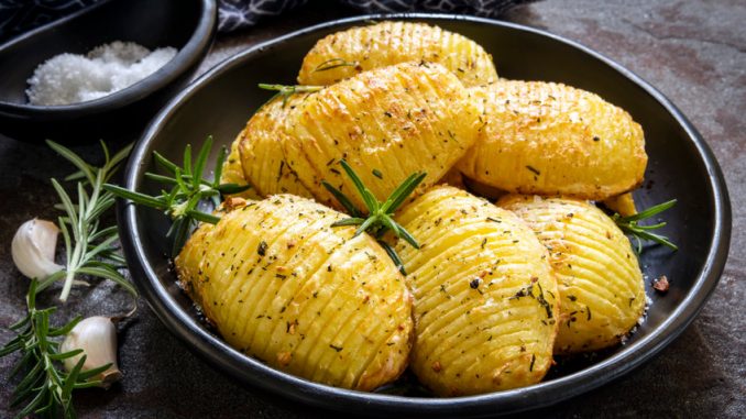 Roasted hasselback potatoes with garlic, rosemary and sea salt.
