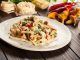 Tagliatelle pasta with chicken and chanterelles mushrooms with creamy sauce
