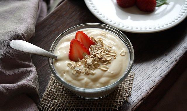 Dairy foods drive medical nutrition - a ramekin of yogurt with strawberries.