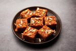 gajar halwa barfi in a black dish