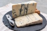 Italian food, buttery or firm blue cheese made from cow milk in Gorgonzola, Milan, Italy close up. raw material for pollo gorgonzola.