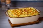 Creamy fish pie or fisherman's pie - traditional British and Irish dish. horizontal image