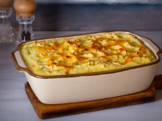 Creamy fish pie or fisherman's pie - traditional British and Irish dish. horizontal image