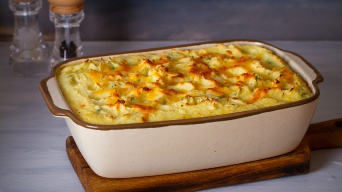 Creamy fish pie or fisherman's pie - traditional British and Irish dish. horizontal image