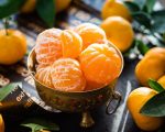 mandarin, peeled and placed in a bowl.
