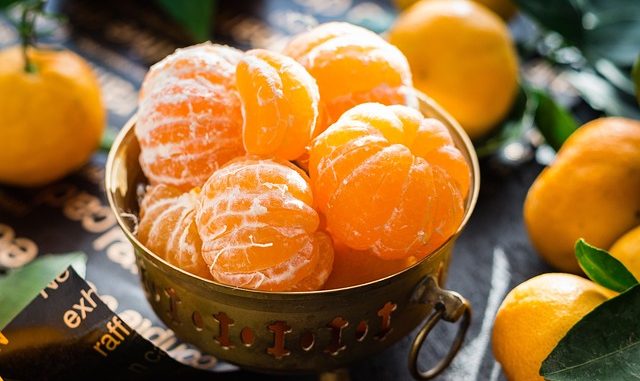 mandarin, peeled and placed in a bowl.