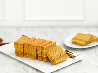 Lapis Legit, Indonesian Traditional Layered Cake on White Table, Copy Space