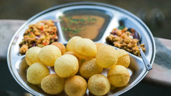 Fresh Homemade pani puri, golgappa with Tamarind Sauce.Famous Indian Nepali Snacks.