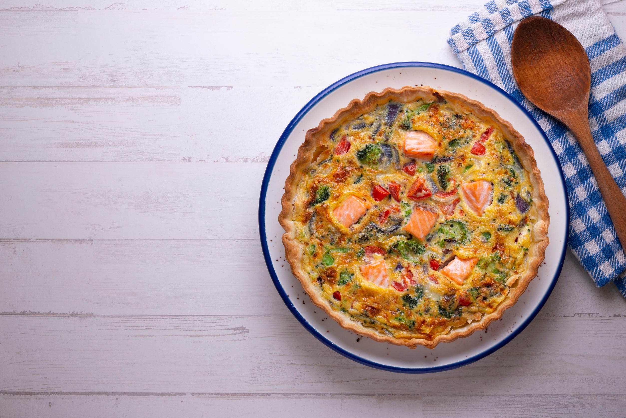 salmon quiche with broccoli and vegetables