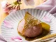 rice cake with bean paste wrapped in a preserved cherry leaf. Japanese Sweets. Sakura mochi