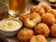 Mixed cheese croquettes with a mayonnaise and mustard dipping sauce.