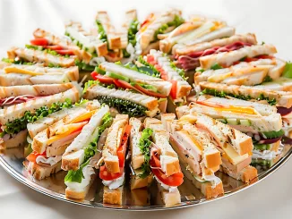 sandwich platter. Variety of sandwiches on wooden background