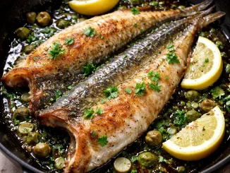 butterflied herring in skillet